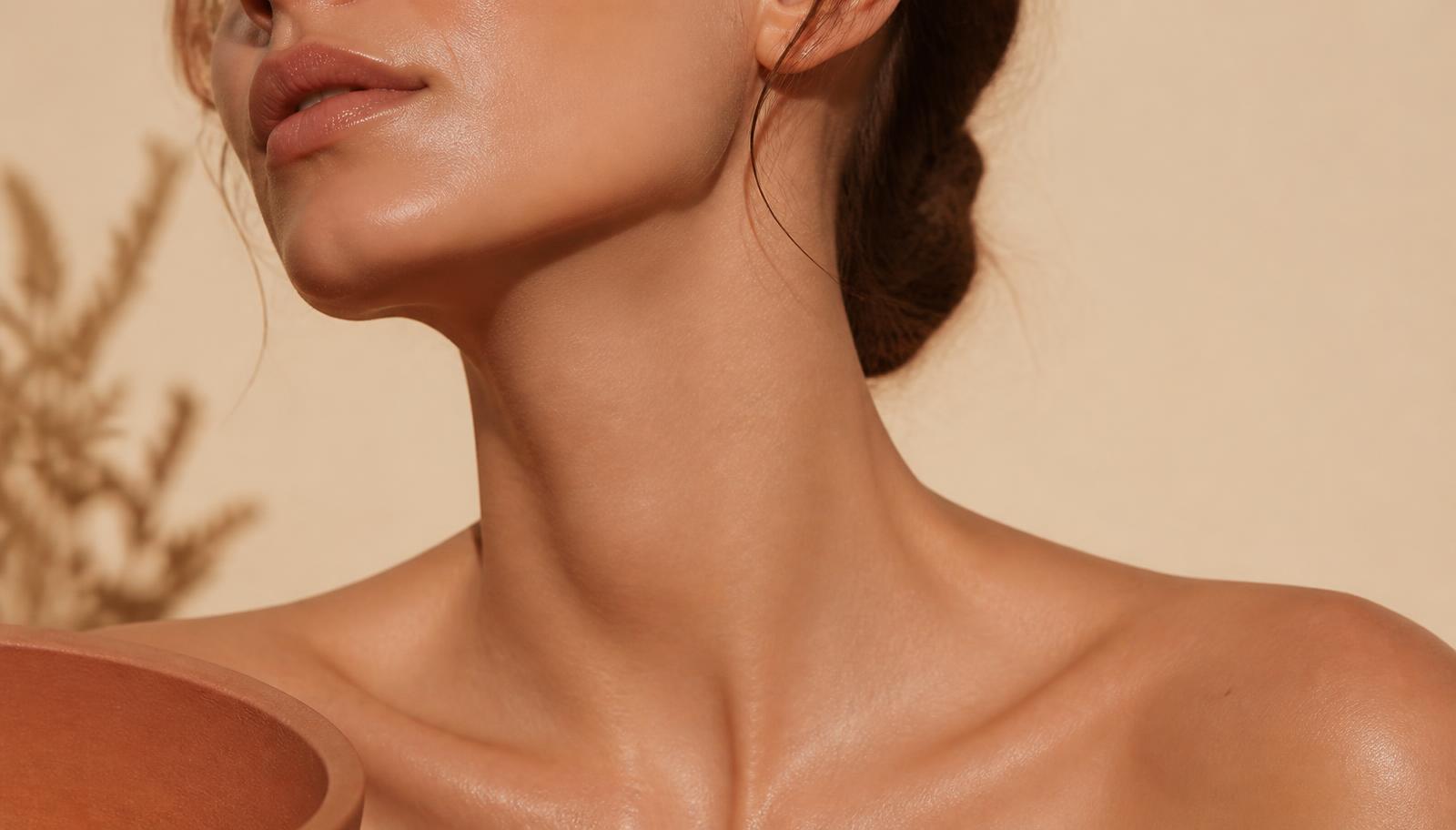 Woman resting after a laser treatment with cool, calm skin in warm golden light